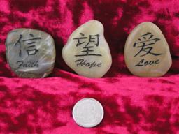 Custom Etched Chinese symbols for Love Faith Hope on polished rocks